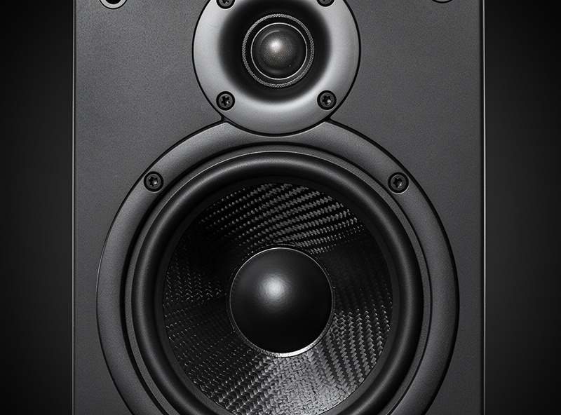 Close-up of bookshelf speaker woofer and tweeter driver detail