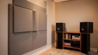 Acoustic panel at the first reflection point on a listening room side wall