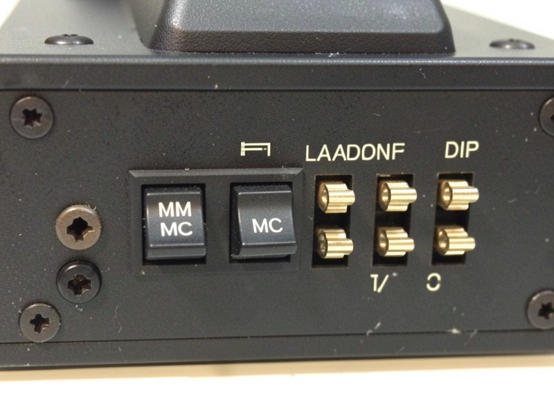 Rear of an outboard phono preamp showing MM MC gain switch and impedance loading options